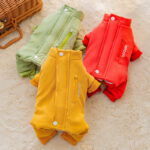Solid color dog one-piece jacket with stand-up collar.